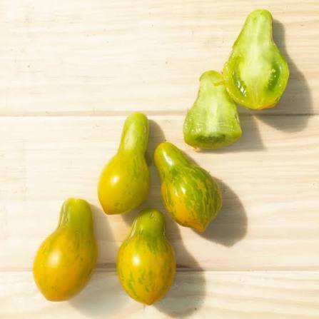 Mint Julep Cherry Tomato Seeds for Planting producing sweet green-striped cherry tomatoes with yellow-green skin in home vegetable gardens