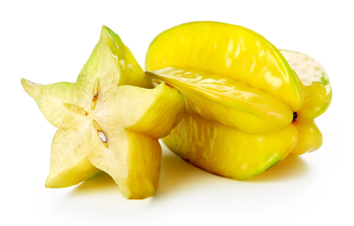 Star fruit seeds for planting to grow a tropical carambola fruit tree with lush green foliage and distinctive golden star-shaped fruits.