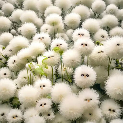 White Cat's Eye Ball flower with distinctive white, rounded blooms displayed among green foliage in an ornamental garden setting.